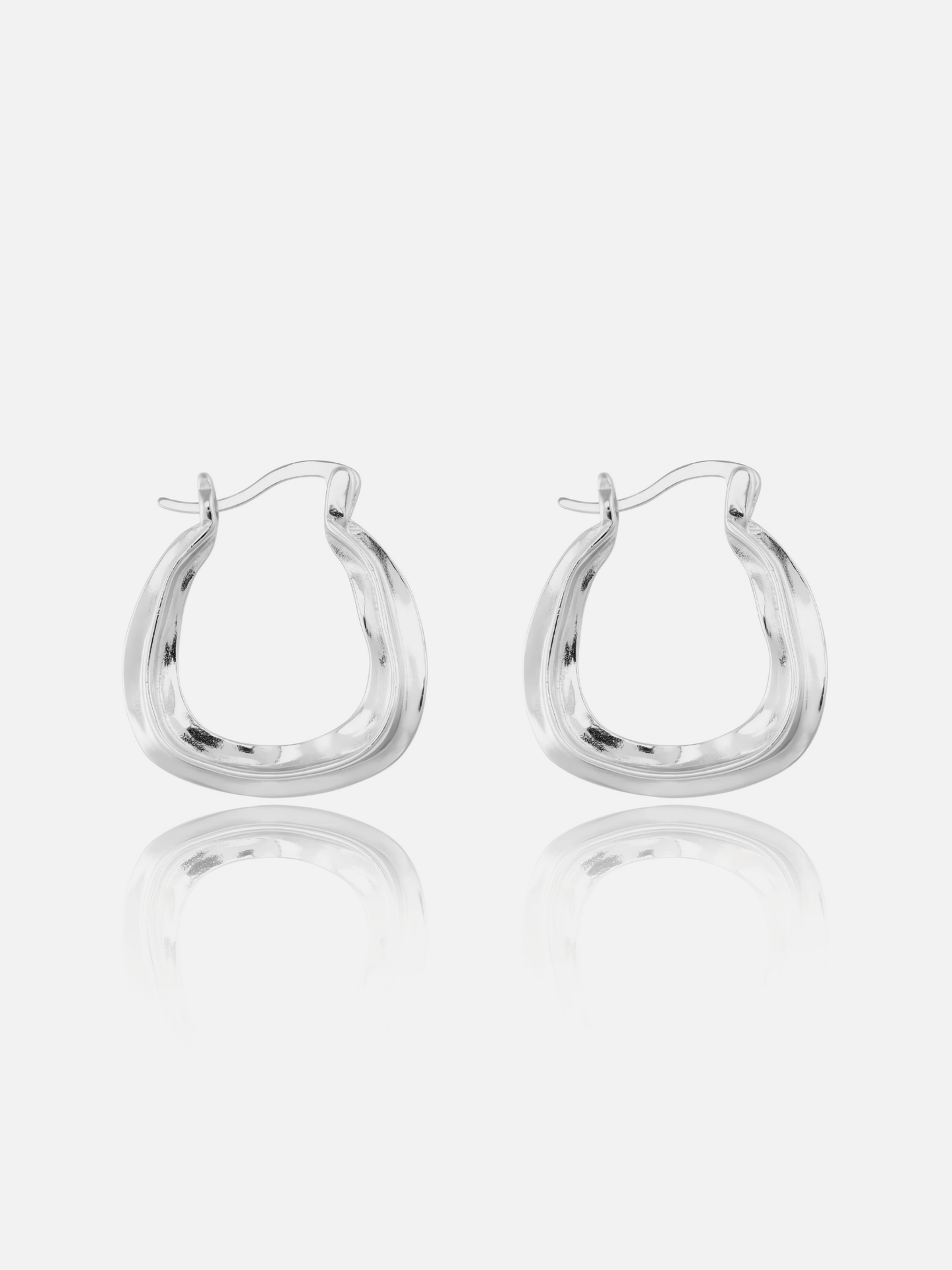 Boucles d'oreilles créoles courbées